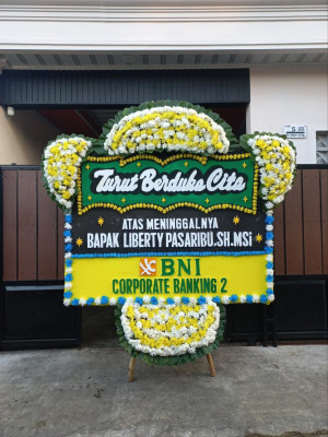 Papan Bunga Duka di Benu Benua