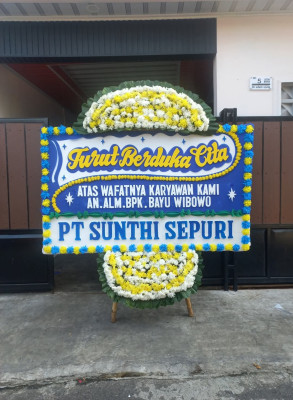 Papan Bunga Duka di Benu Benua