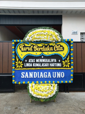 Papan Bunga Duka di Benu Benua