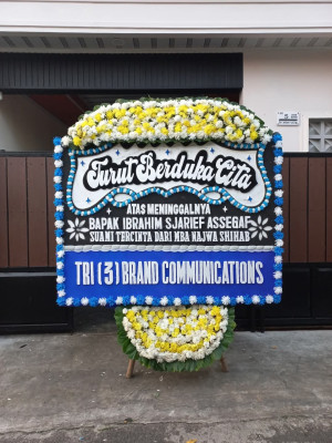 Papan Bunga Duka di Benu Benua